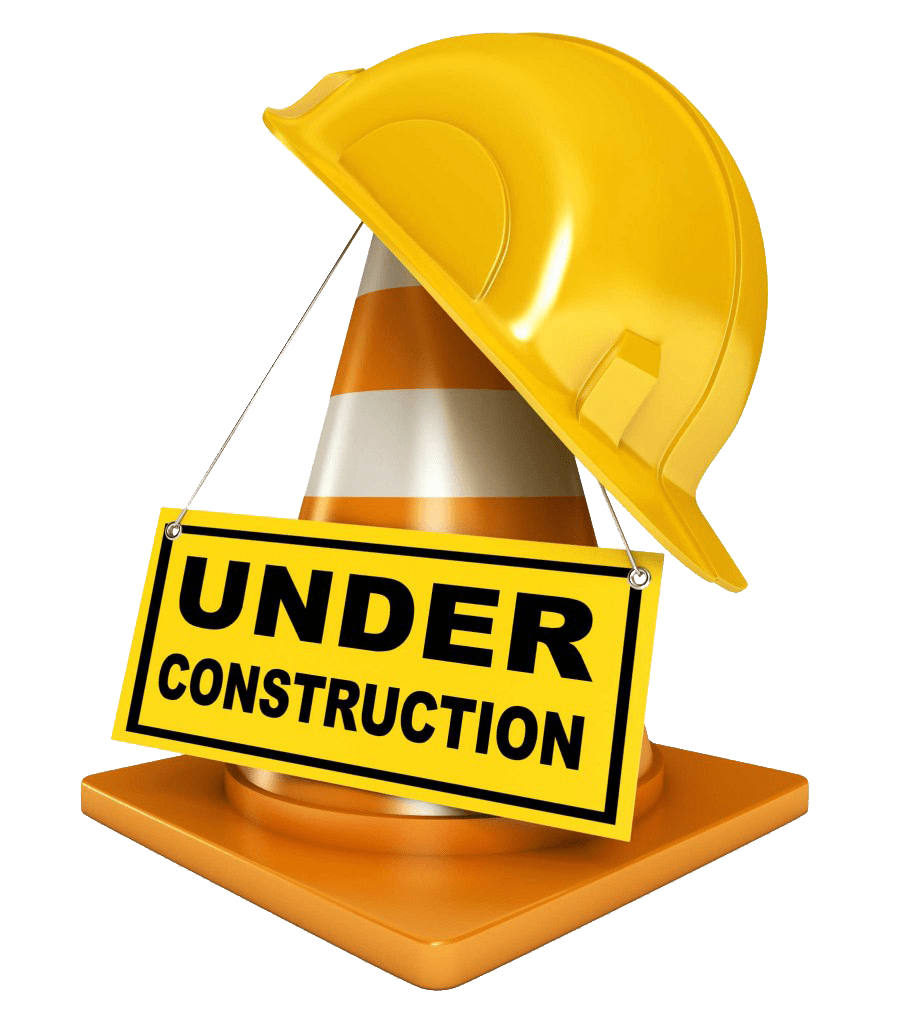 A hard hat placed next to an under construction sign, symbolizing site's status and active construction work in progress.